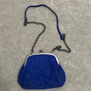 Blue purse with removable chain strap